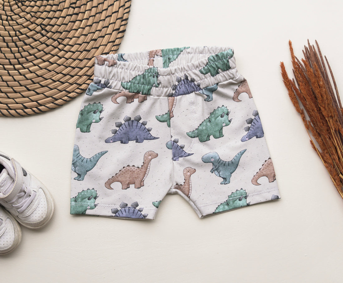 Baggyshorts mit süssem Dinomotiv Grösse 80